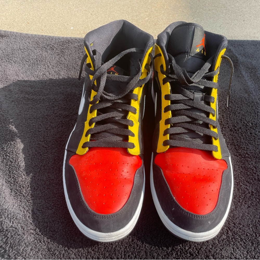 Jordan 1 men size 14 orange/black.